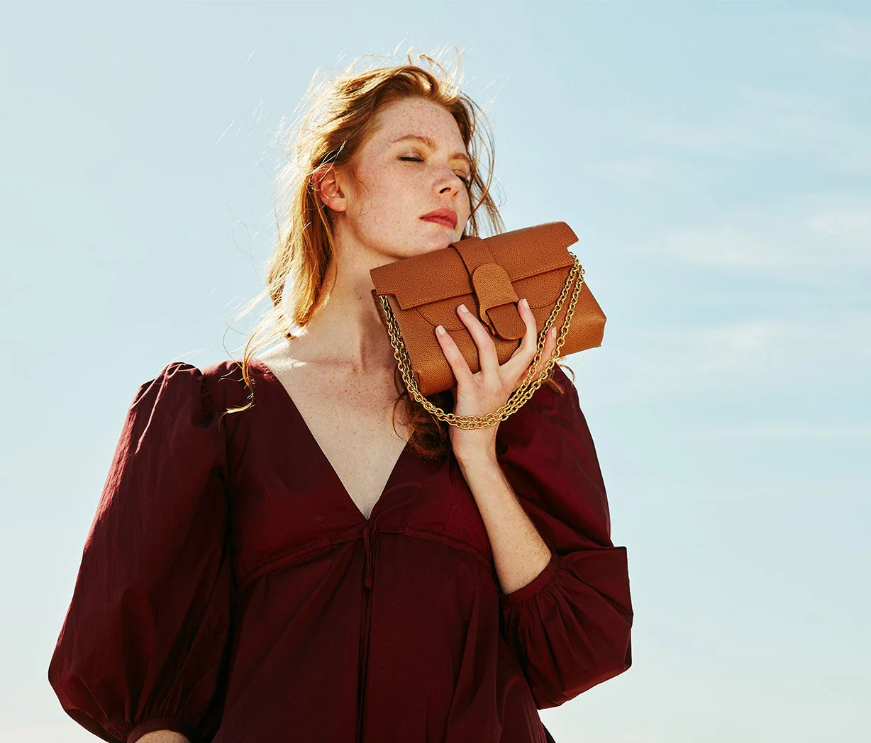 Woman with a grey bag